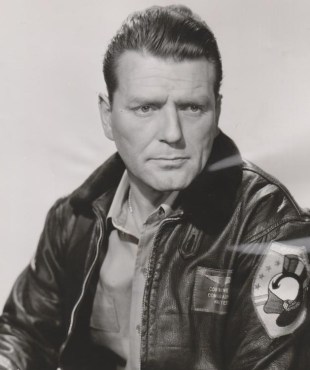 There are two photos that go with this story: a head-and-shoulders photo of McGraw in his ?Bridges at Toko-ri? movie costume, a Korean War drama, and a good photo of him adjusting his TV set in his Des Moines hotel room on Feb. 7, 1955, as he was promoting the same movie, which was being shown at Des Moines? Paramount Theater downtown. Jo Ann in the Register library has already scanned these two photos in. FILE: Charles McGraw, who has a featured rolein 'Bridges at Toko-Ri' at The Paramount will be a Des Moines visitor Monday. Mcgraw is well known on stage and screen and in TV. Copyright 1954, Paramount Pictures Corporation.