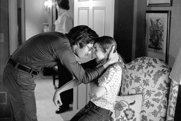 Medium BTS shot of director William Friedkin and Linda Blair as Regan MacNeil.